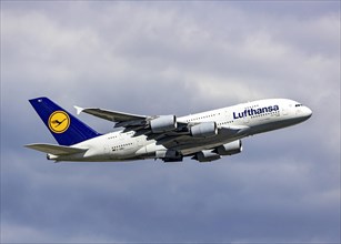 Airbus A380-800 of the airline Lufthansa during take-off at Fraport Airport