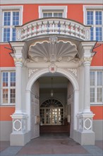 Portal and entrance with ornamentation and balcony to the town hall with town coat of arms built 1725