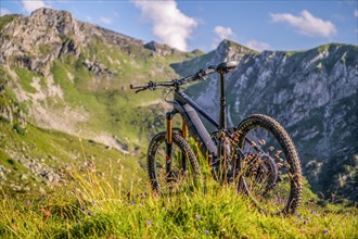 On a sunny summer day on the road with the e-bike in the Zillertal Alps