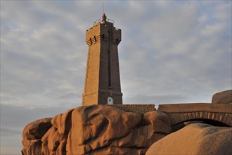 The Pors Kamor lighthouse at sunset along the Cote de granit rose