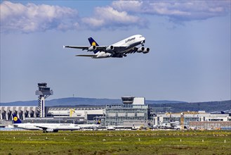 Airbus A380-800 of the airline Lufthansa during take-off at Frapor Airport