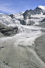 The Moiry Glacier showing moraine and retreating ice and snow in the Pennine Alps