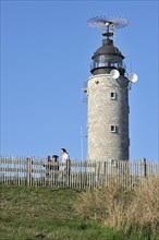 Lighthouse and walkers at Cap Gris Nez