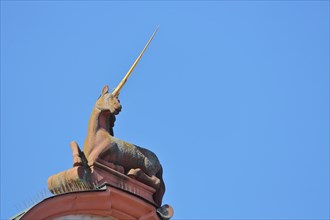 Unicorn with horn on the roof of the town hall