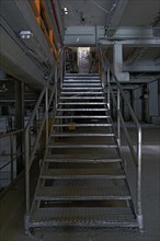 Staircase to the upper factory hall of a former paper mill