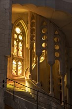 Spiral staircase and stained glass windows