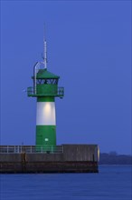 White and green lighthouse Travemuende Nordmole