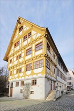 Yellow multi-storey half-timbered house Auf der Insel in Fischerviertel