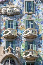 Windows with curved balconies