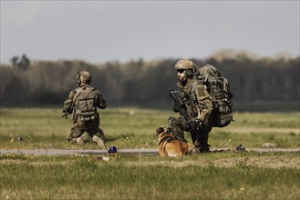 Soldiers of the German Armed Forces as well as a mission dog
