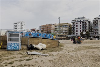 A bust lies on the beach of Durres