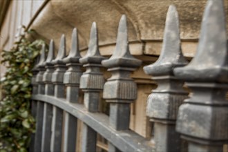 Iron fence in front of a building
