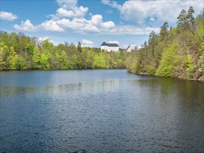 Burgk Castle above the Burhkhammer Dam on the River Saale in Spring