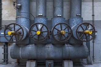 Large steam regulators in a former paper factory