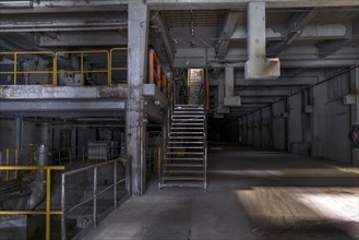 Staircase to the upper factory hall of a former paper mill