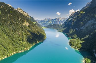 Summer aerial photo with view over the Kloentalersee in the canton of Glarus