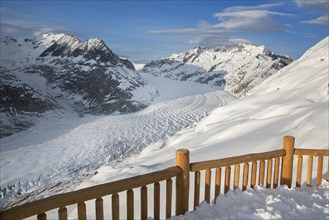 View over the mountains in winter surrounding the Swiss Aletsch Glacier