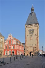 Postplatz rote Alte Apotheke and historic city gate Altpoertel