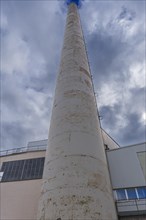 Chimney of the combined heat and power plant of a former paper factory