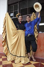 Kofradia dancers in traditional dress