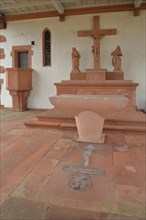Exterior altar with pulpit and memorial slab