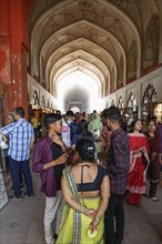 People shop at the Chhatta Chowk Bazaar in the Red Fort