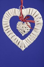 Two white hanging hearts