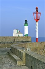 Lighthouse and marine beacon on jetty at Le Treport