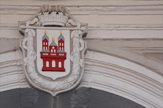 City coat of arms on the town hall in Speyer