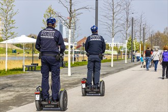 Police officers on patrol with Segway