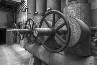 Large steam regulators of a former paper factory