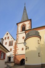 Historic box and gate tower built in 1550 with tithe barn in Haslach