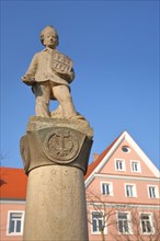 Pretzel fountain with figure and city coat of arms