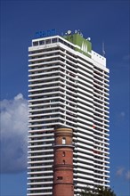 Maritim Hotel and the old lighthouse in the port of Travemuende