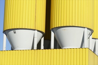 Yellow silos for building material in Hemelinger Hafen