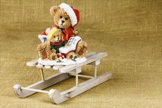 Christmas teddy on a sleigh