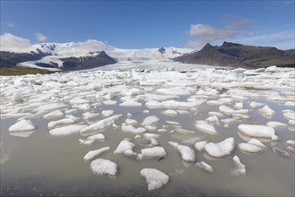 View over the glacier lake Fjallsarlon and Icelandic glacier Fjallsjoekull
