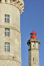 The old Tour Vauban and the new lighthouse Phare des Baleines on the island Ile de Re