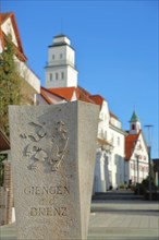 Town coat of arms with unicorn in stone on the Postberg with Old Post Office and Town Hall