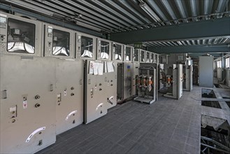 Dismantled power cabinets of a former paper factory