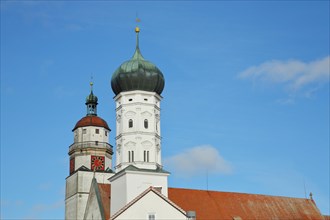 Protestant baroque town church with bell tower and wind tower