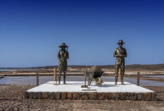 Bronze figures at the salt lake in Lanzarote
