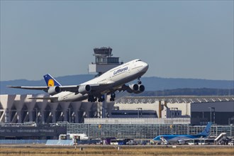 Boeing 747-400 of the airline Lufthansa during take-off at Fraport Airport