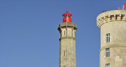 The old Tour Vauban and the new lighthouse Phare des Baleines on the island Ile de Re