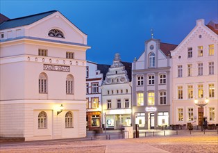 Town Hall on the Market Square with Gabled Houses in the Evening