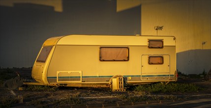 Old caravan trailer in the sunlight