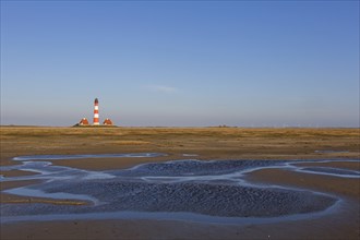Mudflat and saltmarsh in front of the lighthouse Westerhever in spring
