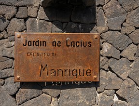 Rusty sign at the entrance