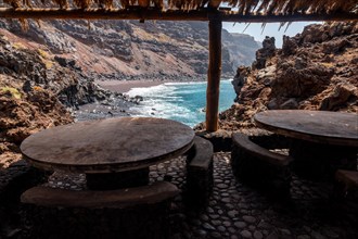 Eating and barbecue areas on the Verodal beach on El Hierro Island. Canary Islands