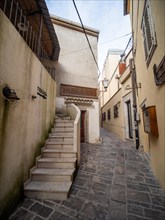 Mediterranean old town with old alleys and houses in the morning